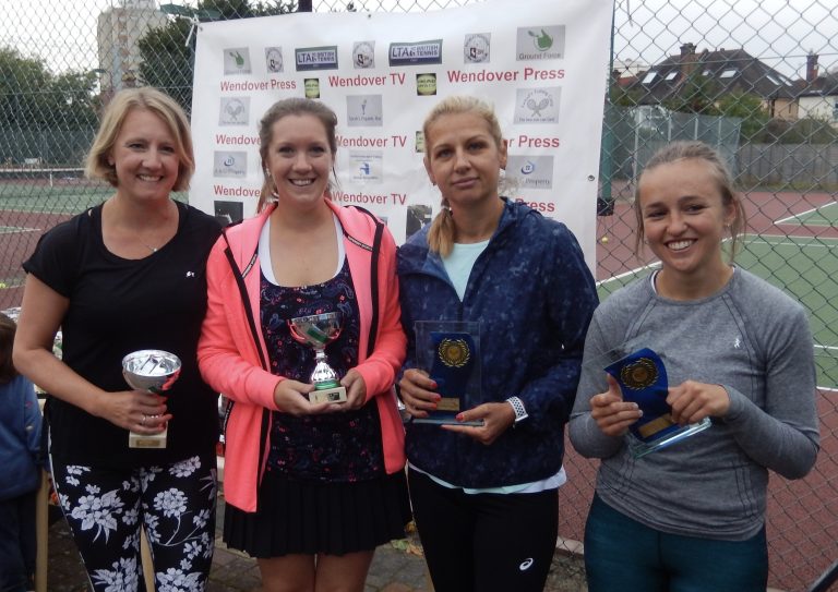 Club members with trophies after a competition